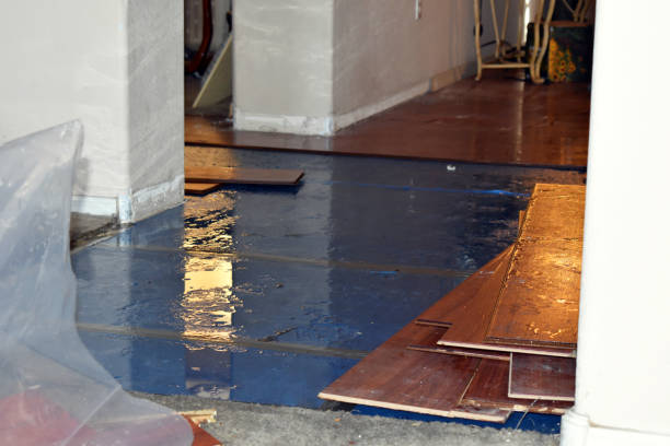 Professional Water Damage Restoration technician working in Rome, NY